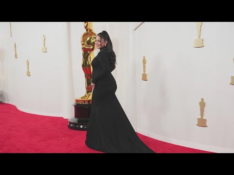 Vanessa Hudgens reveals pregnancy at 2024 Oscars red carpet